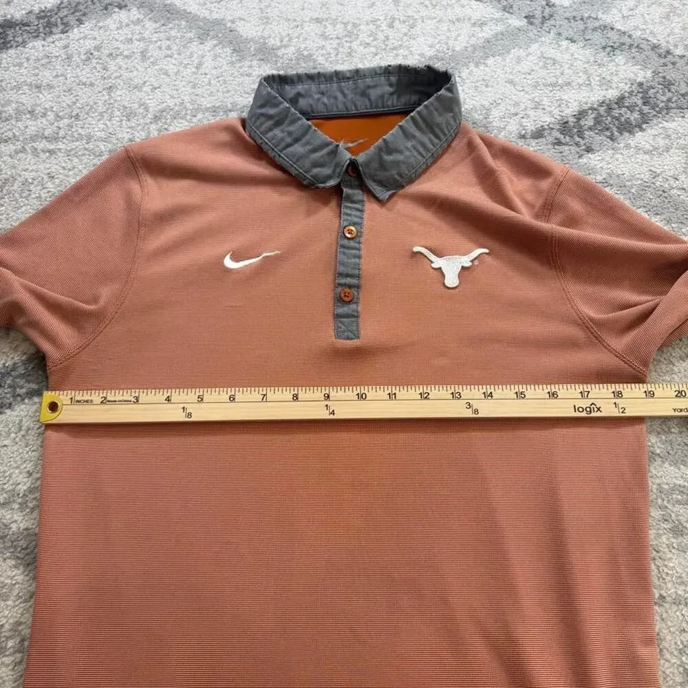 Nike Dri Fit golf polo university of Texas longhorns fits like a small (stain)
